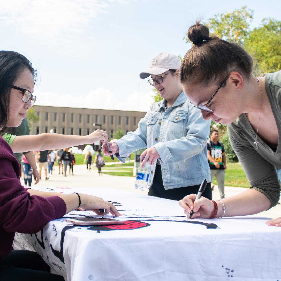 Students at a booth