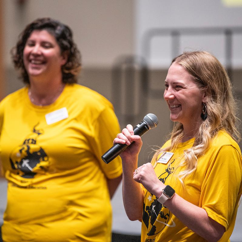 Orientation leaders speak to students.