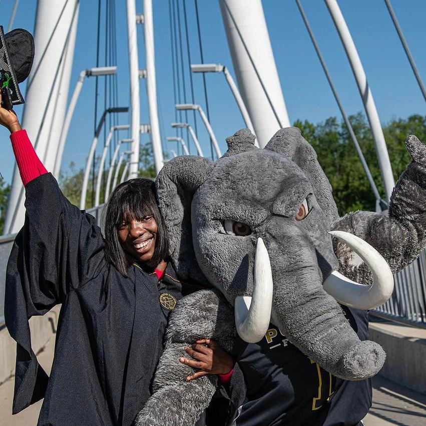 PFW graduates on the Venderly Bridge
