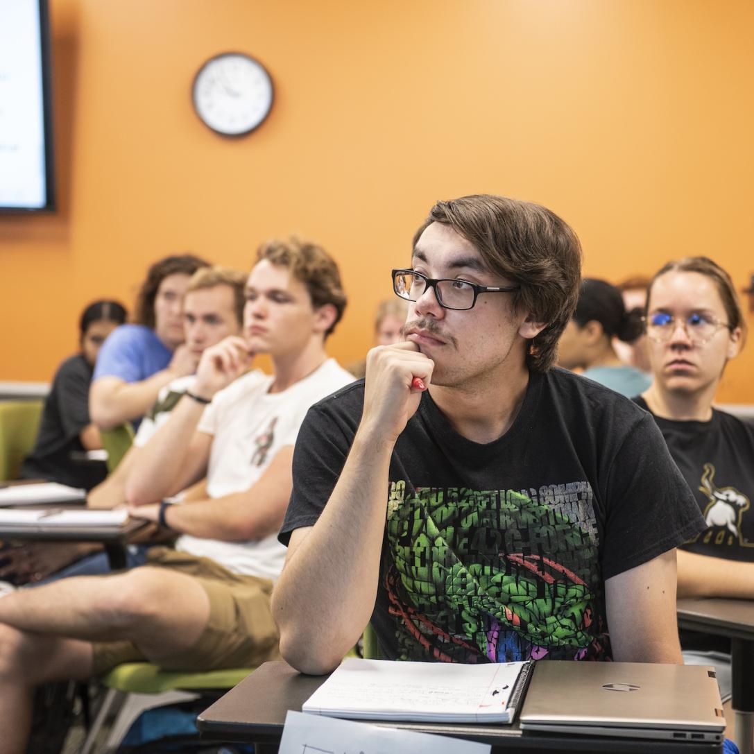 COLA students listen to a lecture.