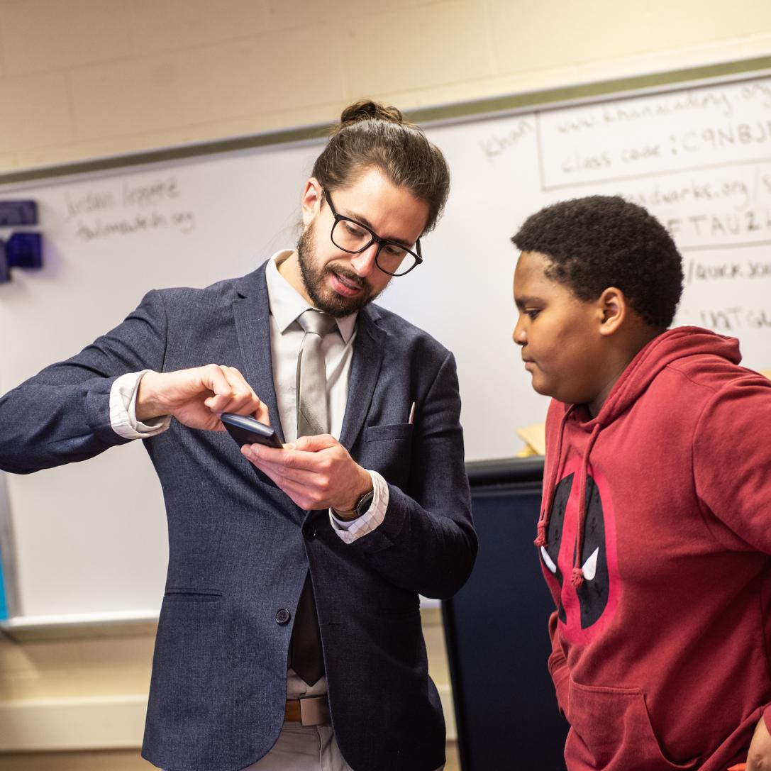 PFW Student teaching a younger student