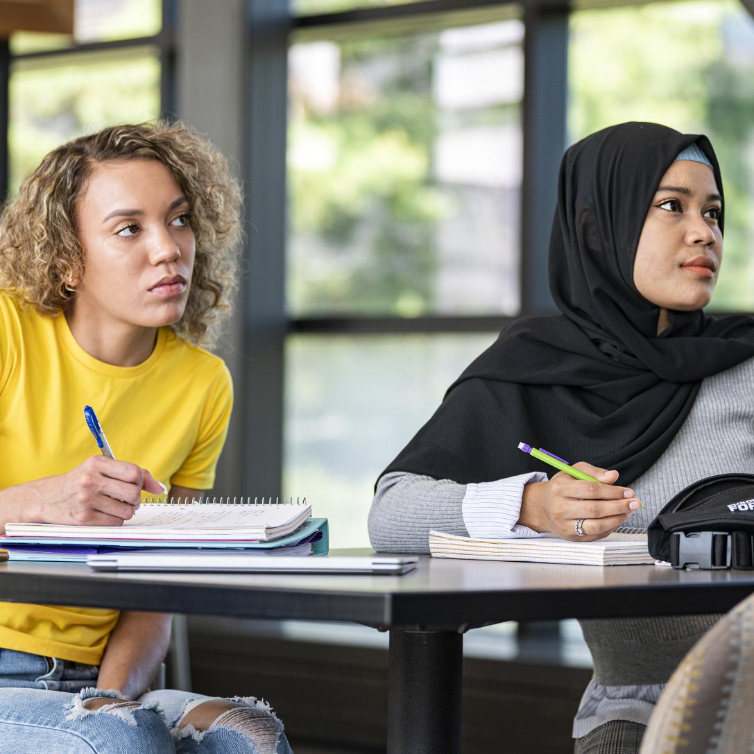 Student listening to lecture.
