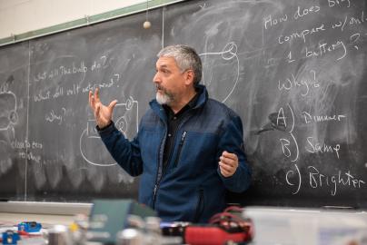 Professor at chalkboard