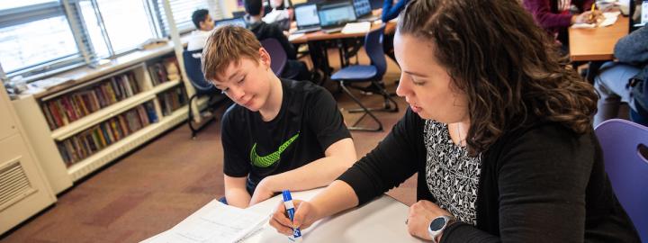 Student and teacher doing math