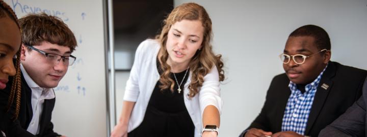 Students at a business meeting