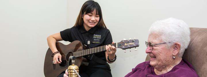 Music therapy sessions with an elderly client.