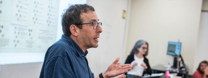 Professors Carr and Badia in a COLA classroom.