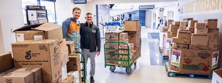 Boxes of food fill a hallway