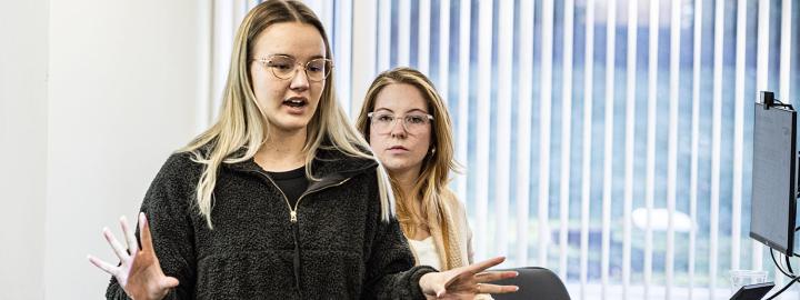 A student is making a business pitch