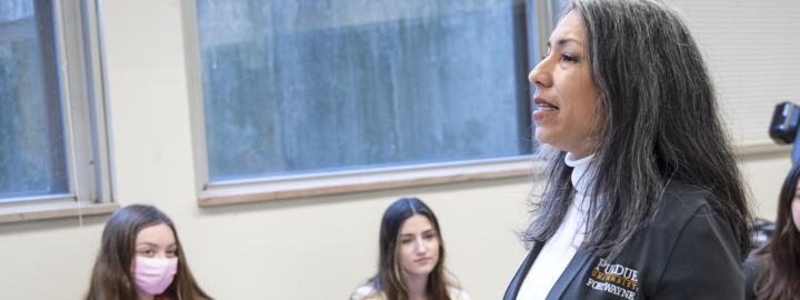 Professor Nuñez Instructing  Students in the Classroom