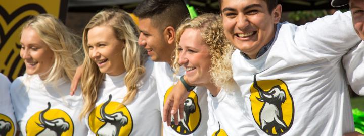 Students Wearing University-branded T-shirts
