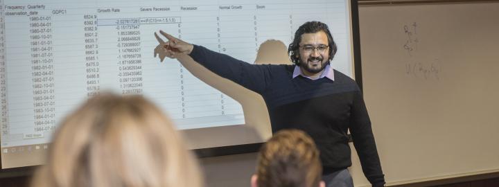 Dr. Nazarov teaching students in classroom