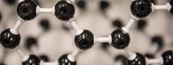 Close up photo of a chemistry framework of atoms connected together.