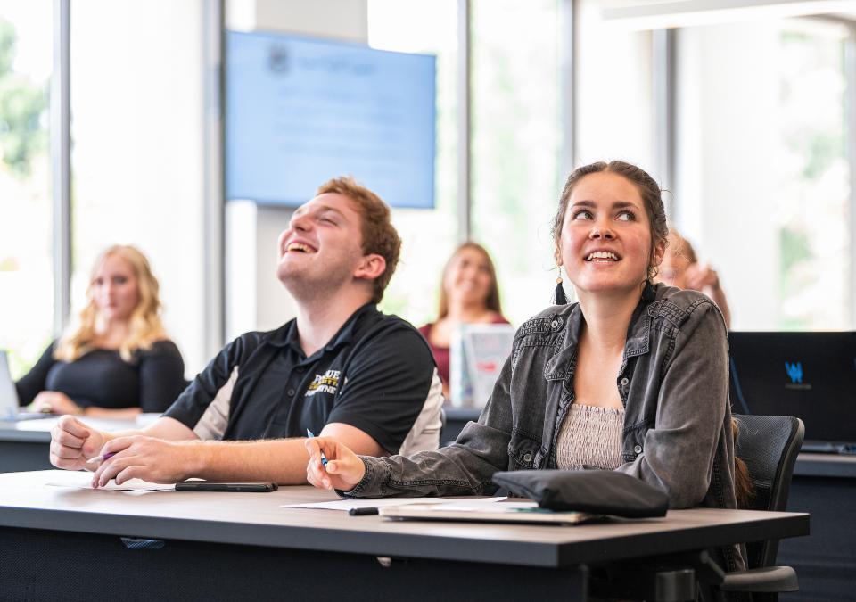 Students enjoy a lecture.