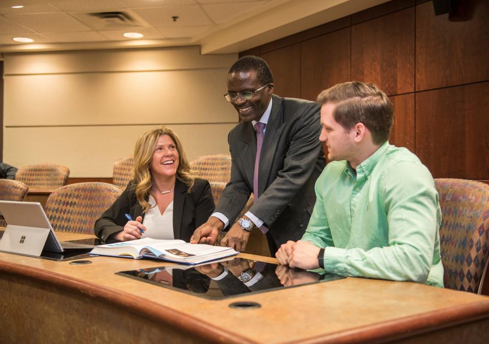 Professor with students