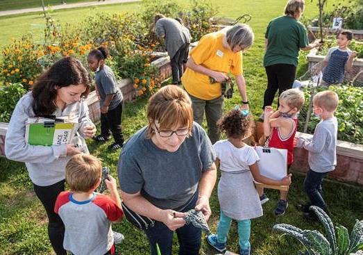 kindergarteners and School of Education students and faculty explore in Purdue Fort Wayne's on-campus urban garden