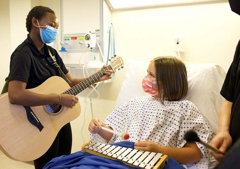 Part of Zana Mlotshwa's undergraduate training as music therapy undergrad at Purdue Fort Wayne includes interactions with patients that are designed to bring normalization and expression to a healthcare setting