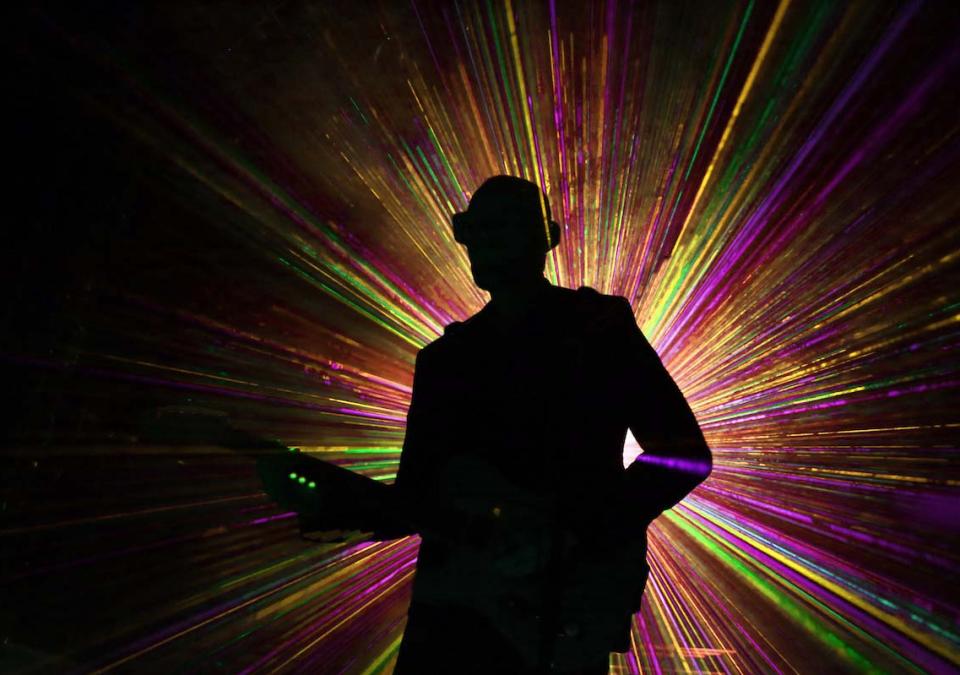 A person is playing laser tag.