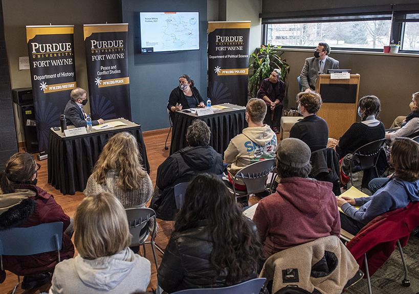 Panelists and audience at a discussion about the Ukraine-Russia conflict