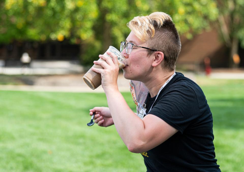 Employee drinks a root beer float.