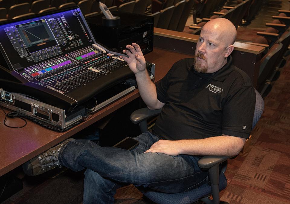 Tom Wilson is relaxing beside a sound board