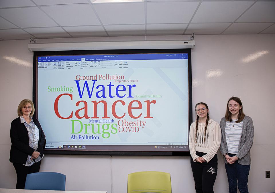 Professor Sherrie Steiner and two of her students