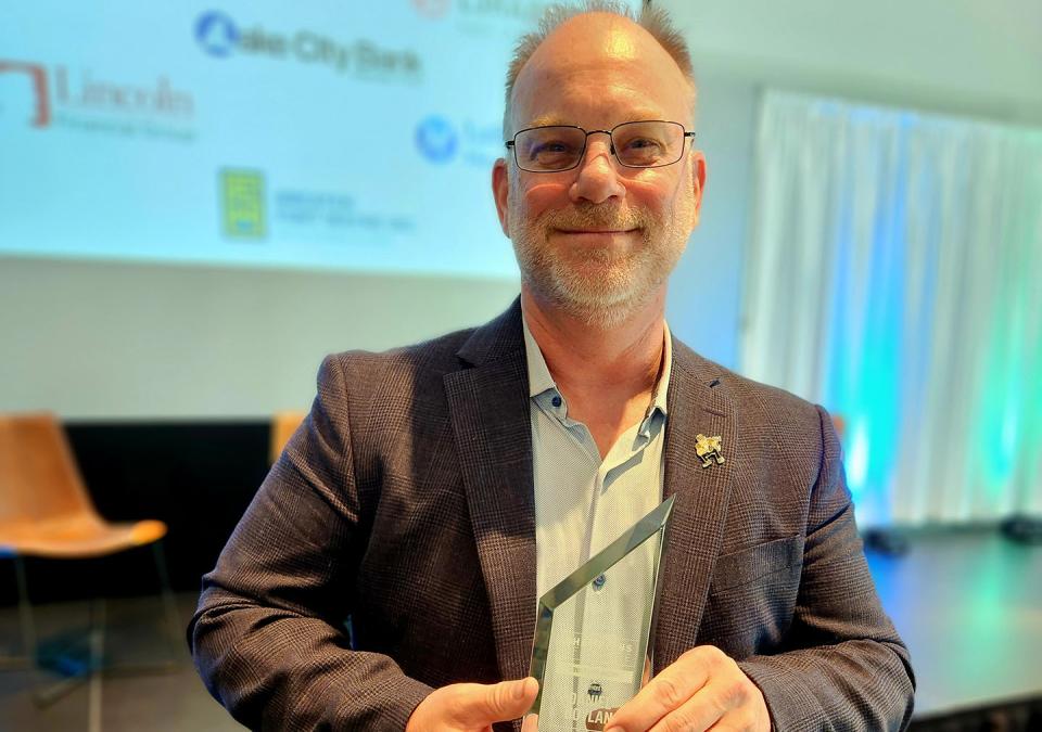 Dan Boylan with his Champions of Change award