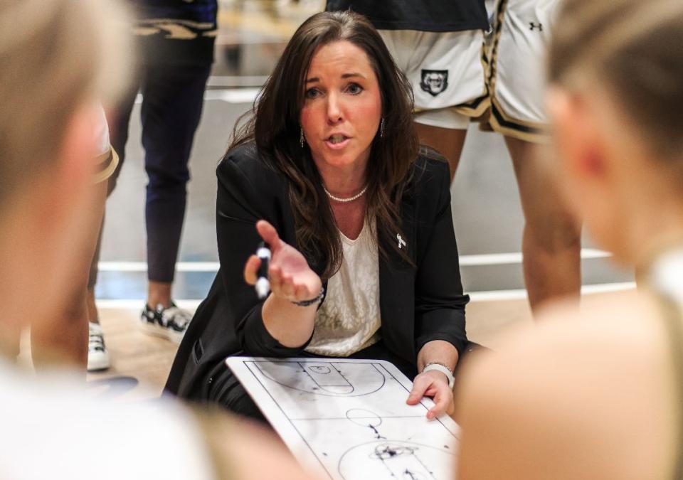 Coach Maria Marchesano is advising the women's basketball team