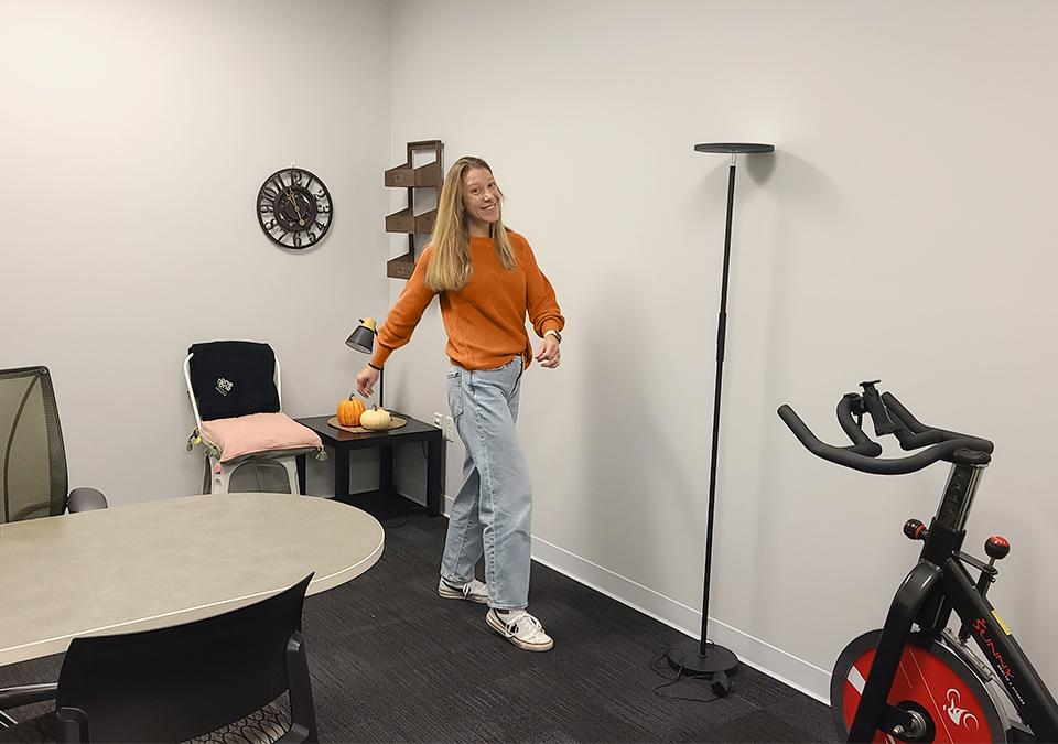 Health coach showing dance fitness steps for 10-minute workout