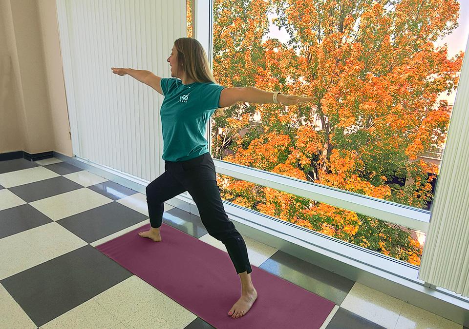 Yoga instructor showing the warrior yoga pose