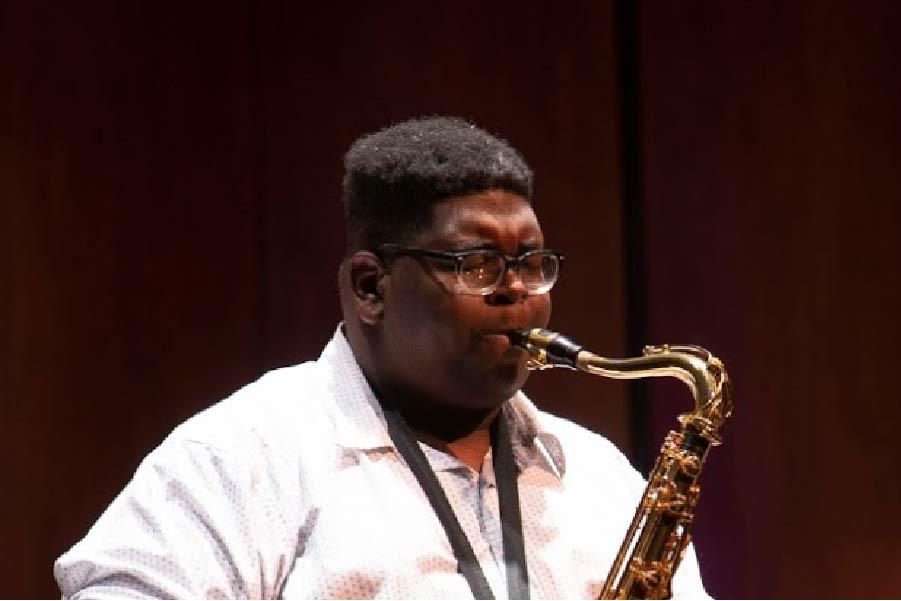 Katahj Copley playing saxophone