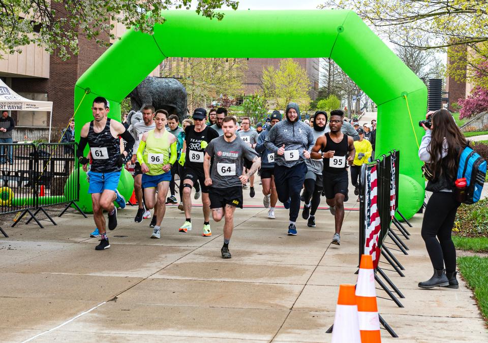 Community members and PFW employees participate in a 5K.