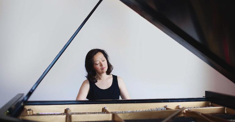 woman playing piano