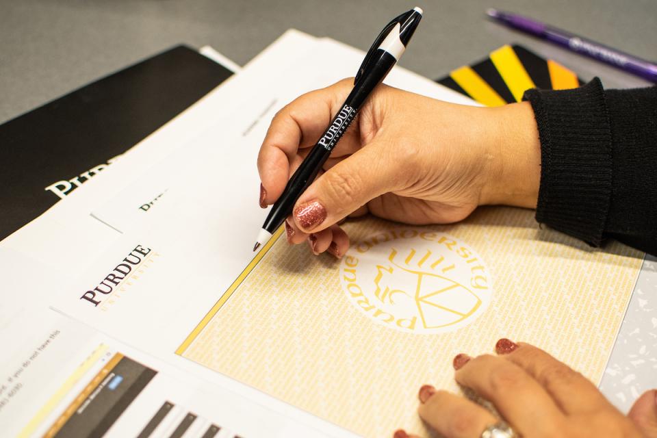 Purdue University branded documents and office supplies.