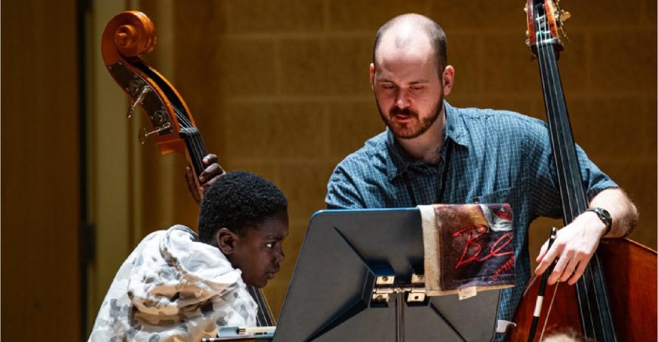 teacher and student on bass