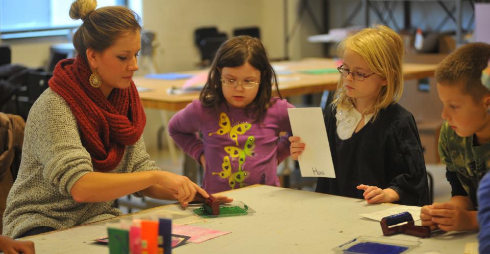 children learning a craft