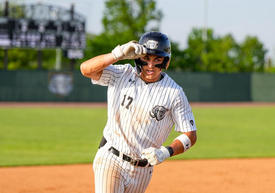 Justin Osterhouse running in a baseball game