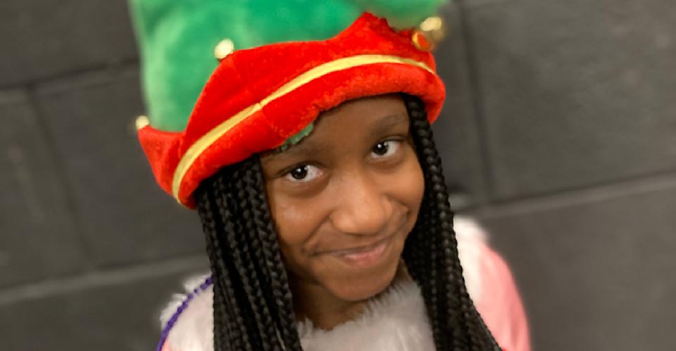 child wearing hat