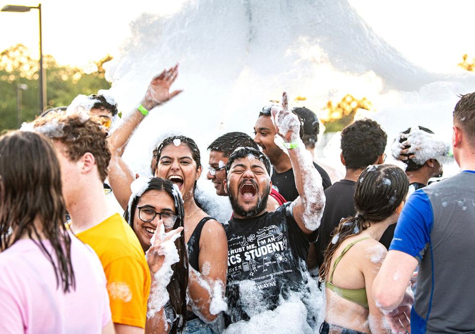Students are having fun at a foam party