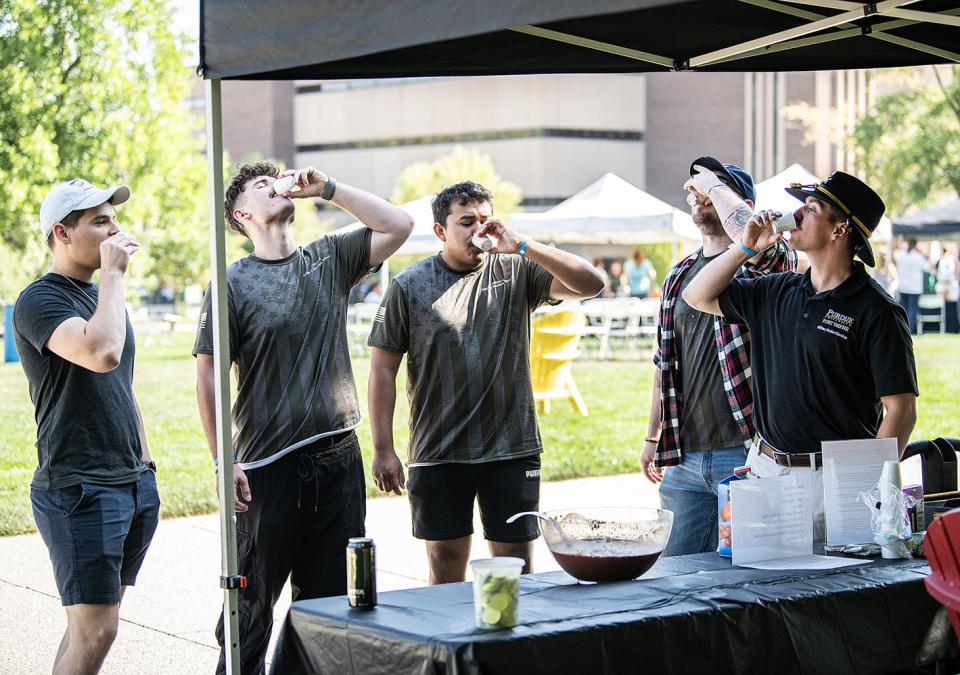 Five veterans are drinking grog