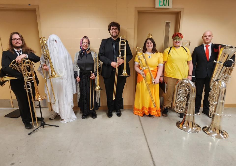 Members of the PFW Orchestra show off their Halloween costumes