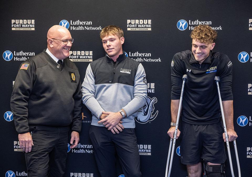 Fort Wayne Fire Department Chief Eric Lahey, PFW golfers Landon Smith and A.J. Agnew