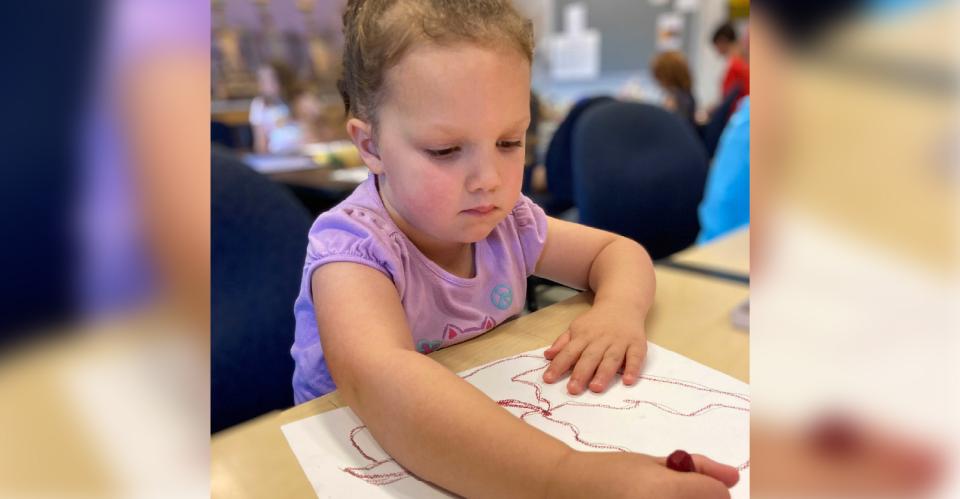 young child coloring