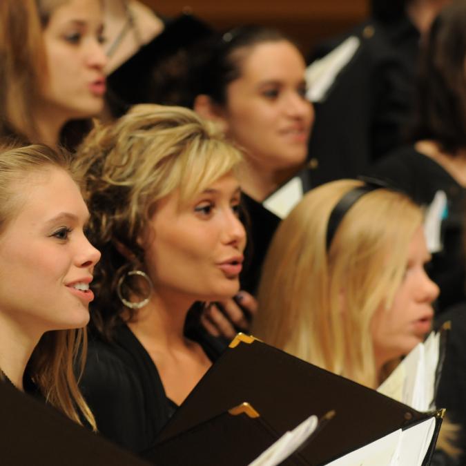 women singing in group