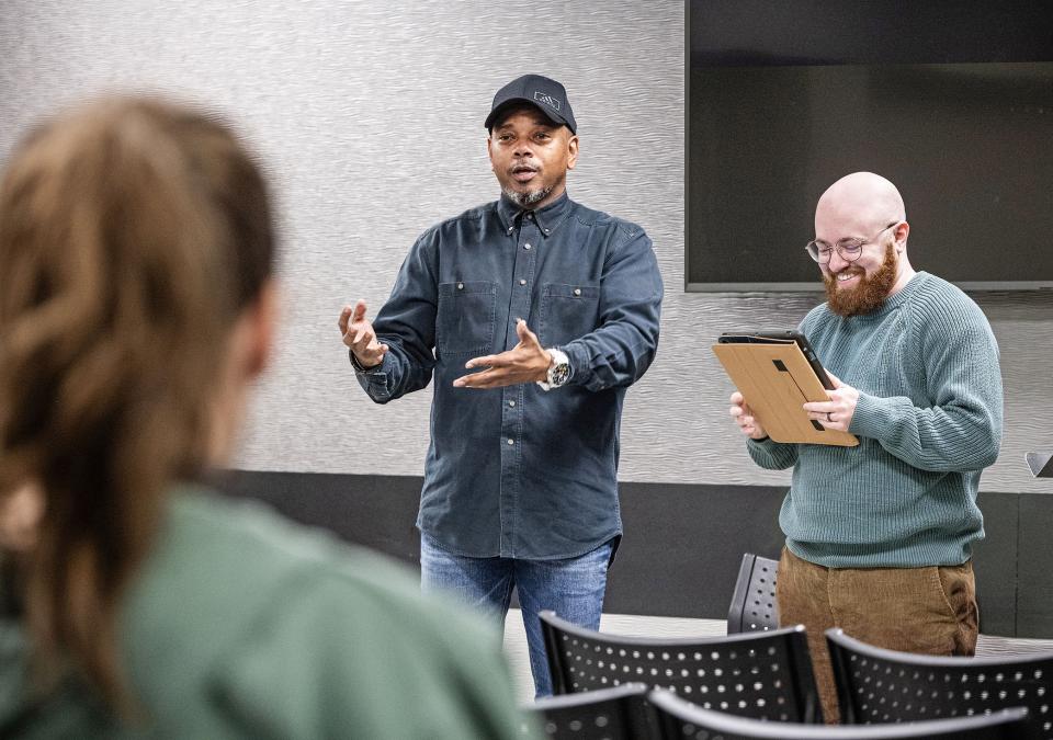 Curtis Crisler is speaking to students in a classroom