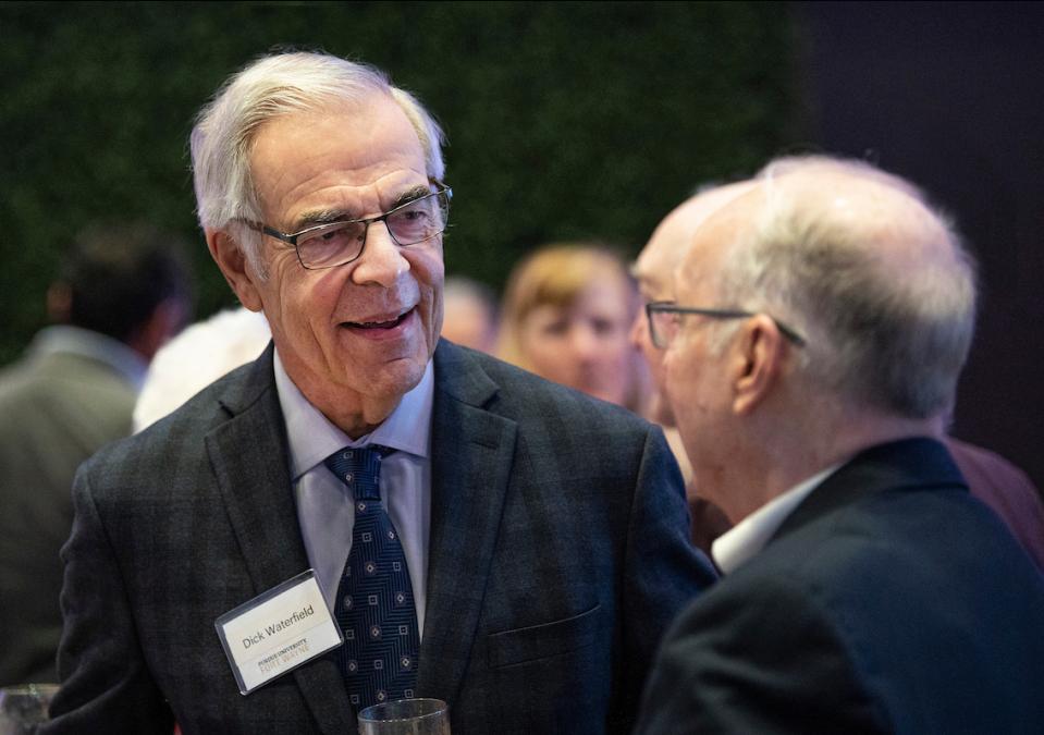 Richard Waterfield is having a conversation with someone