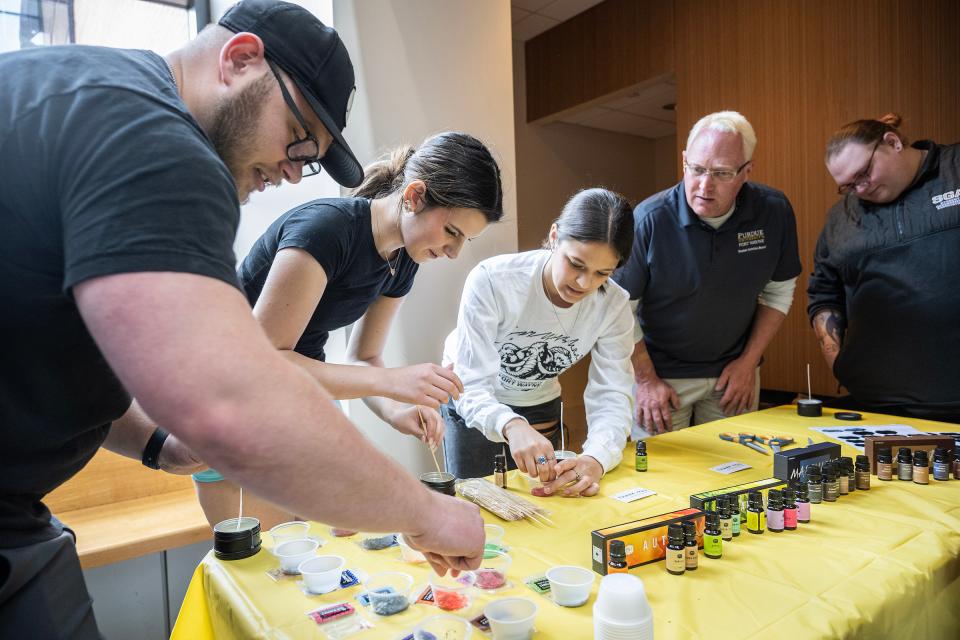 students at a craft table