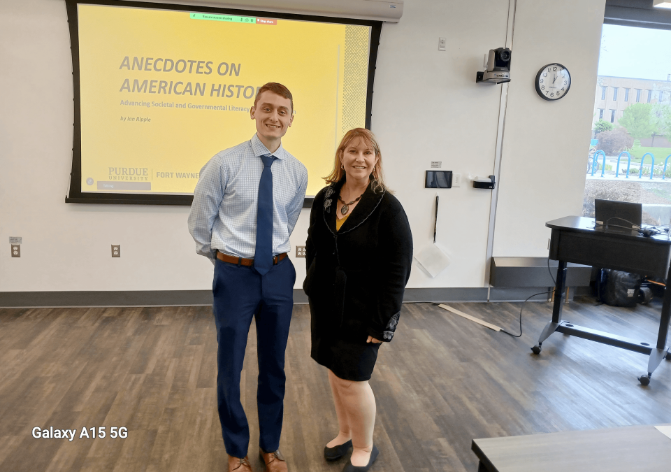 Ian ripple and Kim O'Connor in a classroom