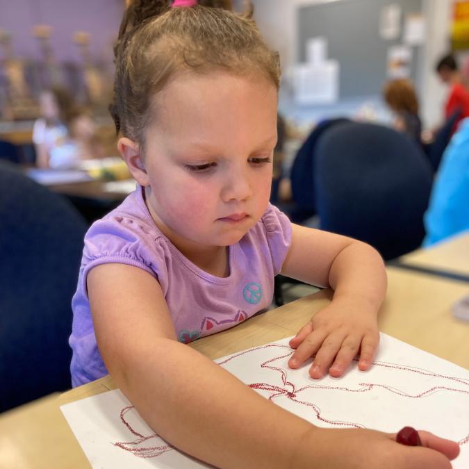 young child drawing