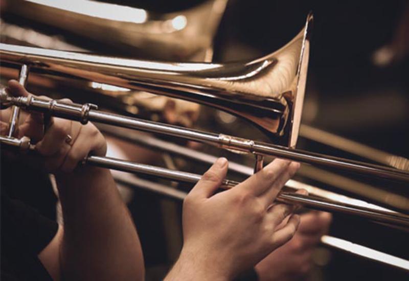 trombone players performing
